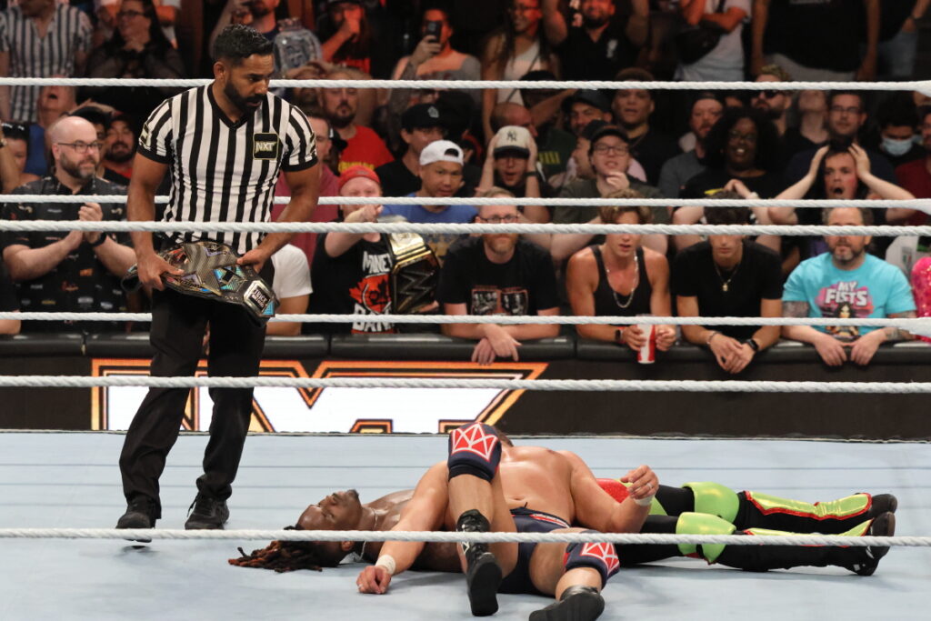 A dazed Ethan Page, after taking a jumping knee strike from Trick Williams, falls into the cover and becomes the new NXT Champion at Scotiabank Arena in Toronto. Photo by Steve Argintaru, Twitter/IG: @stevetsn