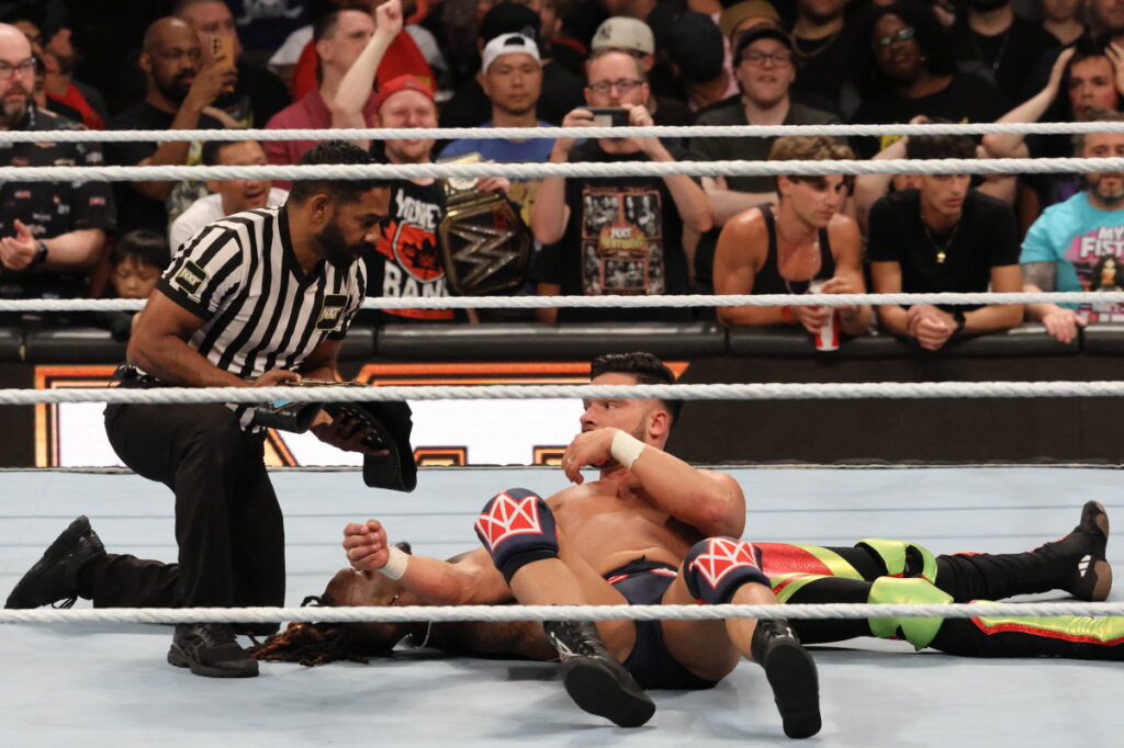 A dazed Ethan Page, after taking a jumping knee strike from Trick Williams, falls into the cover and becomes the new NXT Champion at Scotiabank Arena in Toronto. Photo by Steve Argintaru, Twitter/IG: @stevetsn