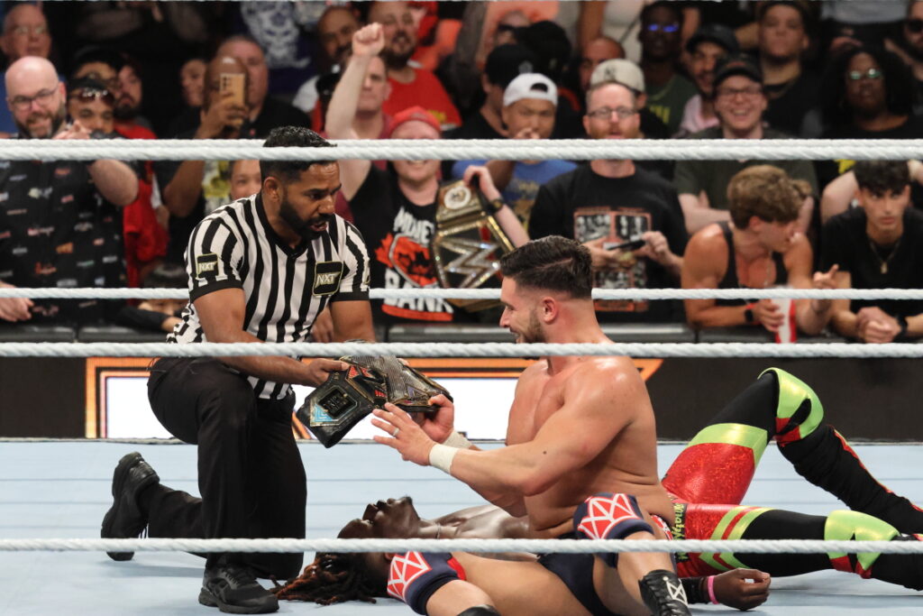 A dazed Ethan Page, after taking a jumping knee strike from Trick Williams, falls into the cover and becomes the new NXT Champion at Scotiabank Arena in Toronto. Photo by Steve Argintaru, Twitter/IG: @stevetsn