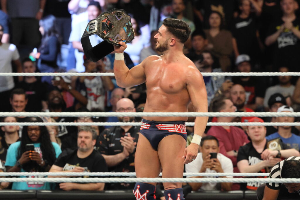 Ethan Page admires the NXT championship belt after winning a Fatal 4-Way match vs. Trick Williams, Shawn Spears and Je'Von Evans at NXT Heatwave at Scotiabank Arena in Toronto. Photo by Steve Argintaru, Twitter/IG: @stevetsn