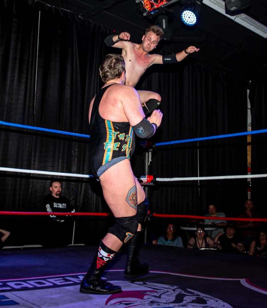 Chase Pearce delivers a dropkick in June 2024. Photo by Dave Watling