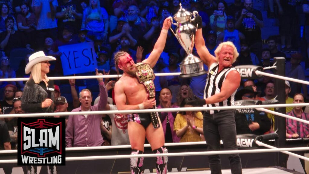 Martha Hart with Owen Hart Cup winner Bryan Danielson and referee Jeff Jarrett at AEW Dynamite at the Scotiabank Saddledome in Calgary, Alberta, on July 10, 2024. Photo by Jason Clevett