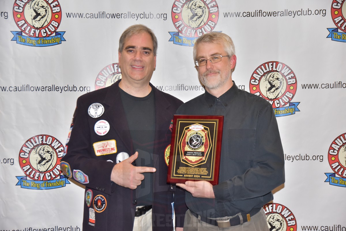 Jason Presley, recipient of the James C. Melby Award for wrestling history, with his presenter Greg Oliver at the Cauliflower Alley Club reunion at the Plaza Hotel & Casino in Las Vegas on Wednesday, August 21, 2024. Photo by Scott Romer