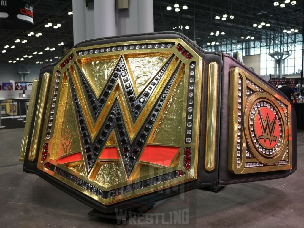 A huge WWE title belt on display at Fanatics Fest NYC, Friday, August 16 to Sunday, August 18, 2024, at the Jacob K. Javits Convention Center, in New York City Photo by George Tahinos, https://georgetahinos.smugmug.com