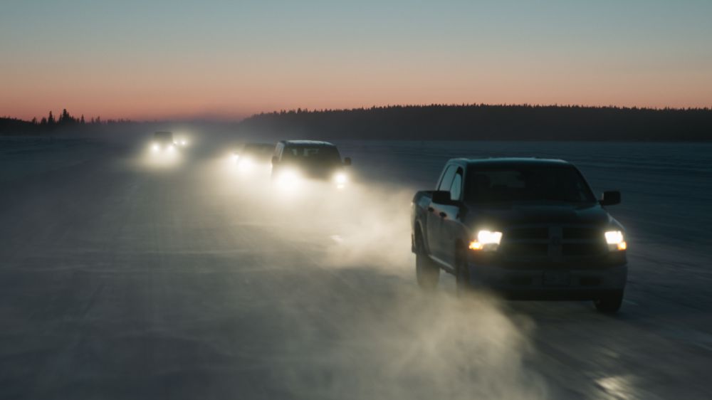 Sunset as the trucks drive over the ice in The Death Tour documentary.