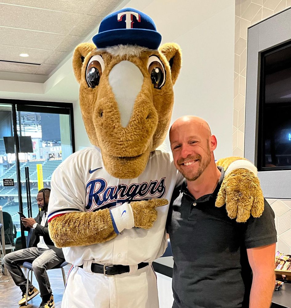 Rangers Captain, the team mascot, and referee Bryce Remsburg at the announcement of All In for 2025 at Globe Life Field in Arlington, Texas. Bryce Remsburg Facebook photo