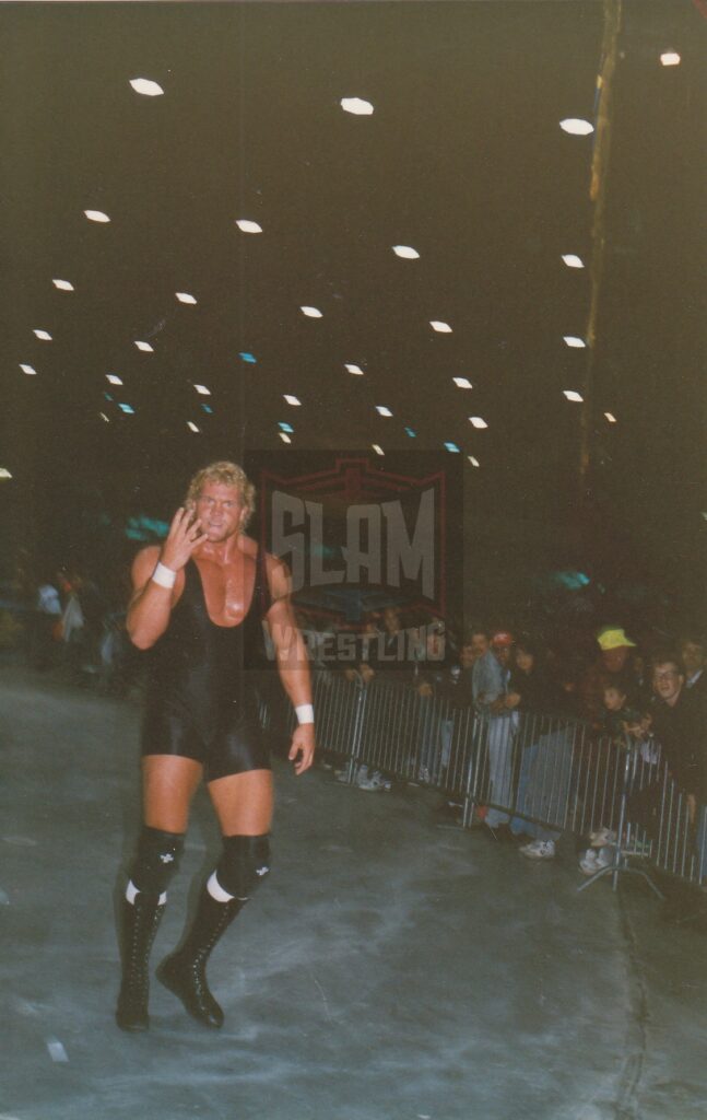 Sid Vicious puts up the Four Horsemen symbol during a bout in Toronto. Photo by Terry Dart