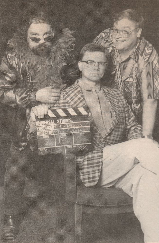 Mark Engebretson, seated, with Donn Wingate and Donn Seales.