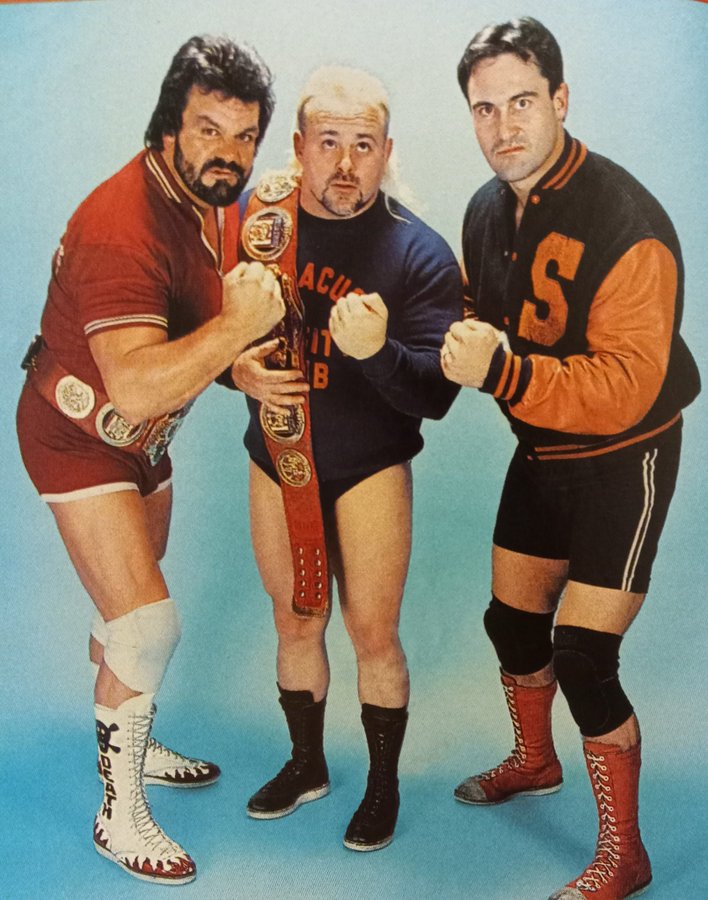 Steve Williams, Kevin Sullivan and Mike Rotunda in the Varsity Club.