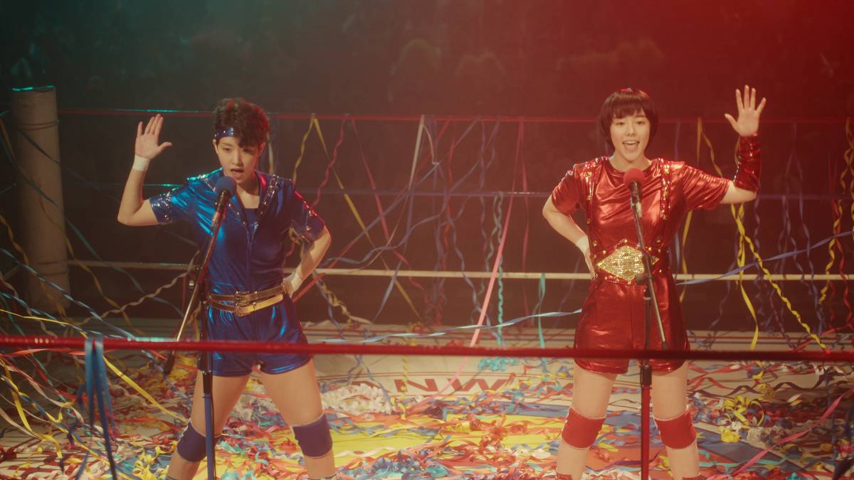 The Crush Gals in one of their pre-match pop performances in The Queen of Villains. Netflix photo