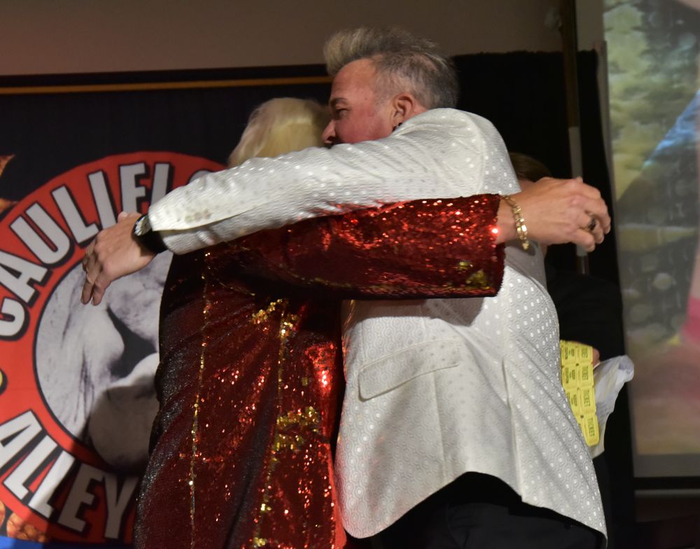 "Nature Boy" Paul Lee hugs Marcus "Buff" Bagwell at the Cauliflower Alley Club reunion at the Plaza Hotel & Casino in Las Vegas on Wednesday, August 21, 2024. Photo by Scott Romer