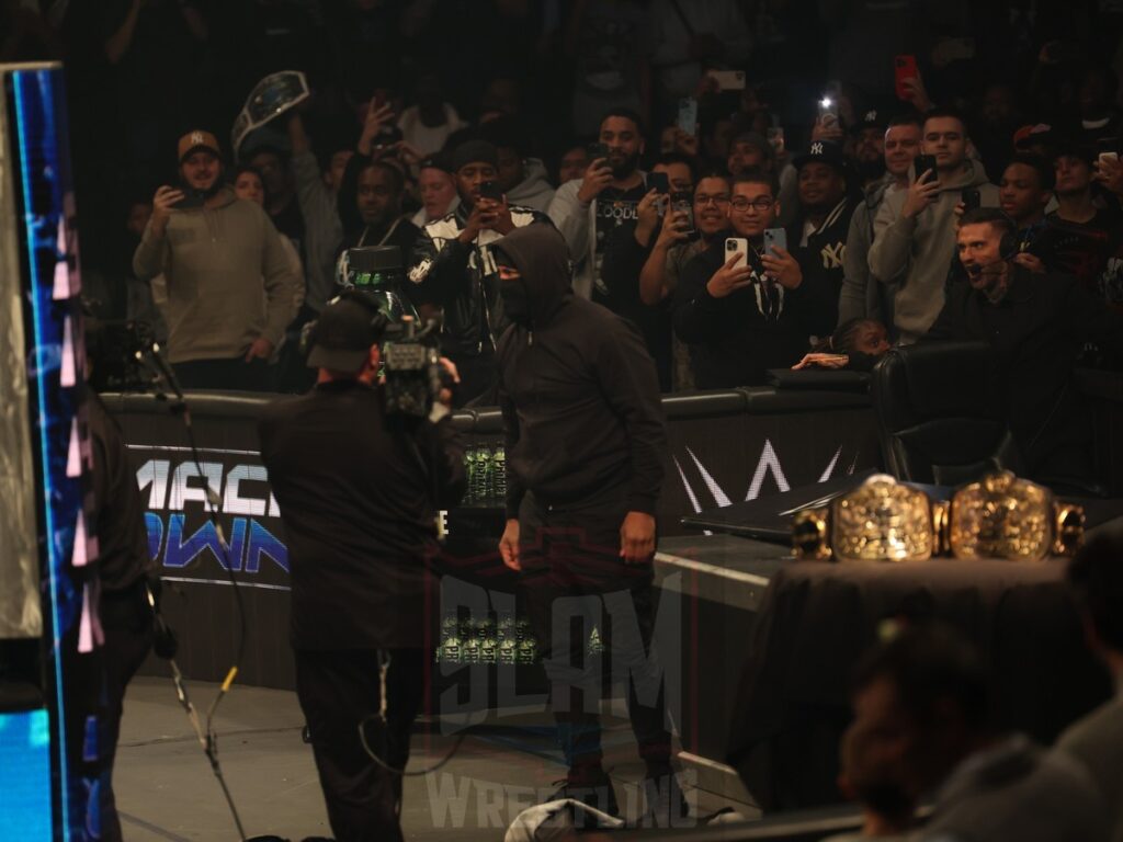 A mysterious figure at ringside during the Tag Team Championship match between The Bloodline vs Motor City Machine Guns (Chris Sabin and Alex Shelley) at WWE Smackdown on Friday, October 25, 2024, at the Barclays Center in Brooklyn, NY. Photo by George Tahinos, https://georgetahinos.smugmug.com