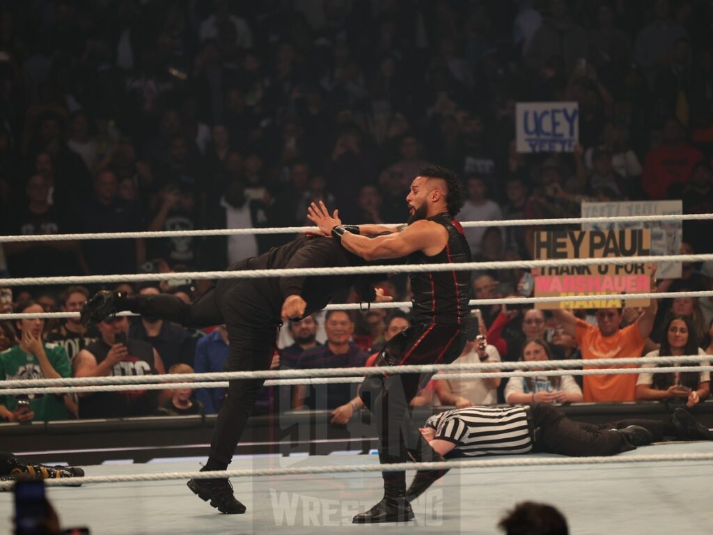 A mysterious figure interrupts the Tag Team Championship match between The Bloodline vs Motor City Machine Guns (Chris Sabin and Alex Shelley) at WWE Smackdown on Friday, October 25, 2024, at the Barclays Center in Brooklyn, NY. Photo by George Tahinos, https://georgetahinos.smugmug.com