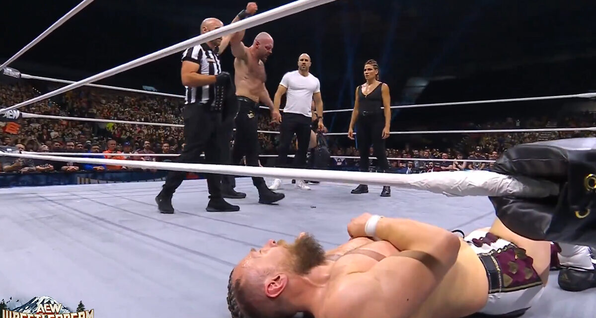 Jon Moxley and Marina Shafir stand over a beaten Bryan Danielson at AEW WrestleDream at the Tacoma Dome, in Tacoma, Wash., on Saturday, October 12, 2024. AEW photo