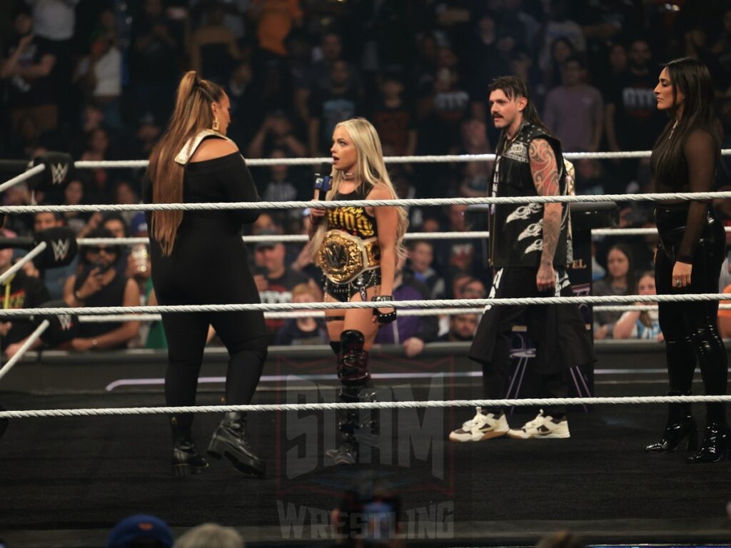 WWE Women’s World Champion Liv Morgan (with Dominik Mysterio and Sonya Deville) interrupts WWE Women’s Champion Nia Jax at WWE Smackdown on Friday, November 1, 2024 (taped October 25, 2024), at the Barclays Center in Brooklyn, NY. Photo by George Tahinos, https://georgetahinos.smugmug.com