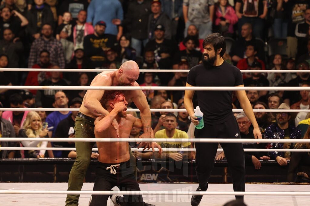 Post-match, Wheeler Yuta and Jon Moxley continue to beat up Orange Cassidy at AEW Full Gear on Saturday, November 23, 2024, at the Prudential Center in Newark, NJ. Photo by George Tahinos, https://georgetahinos.smugmug.com