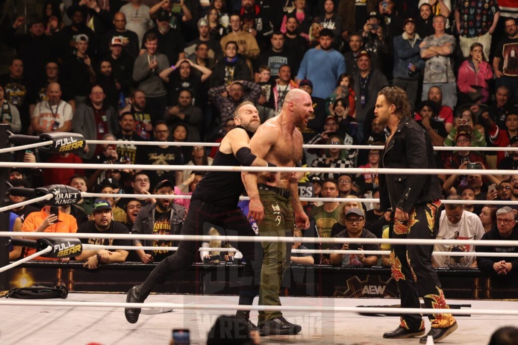 Christian Cage blindsides Jon Moxley, who is yelling at "Hangman" Adam Page, at AEW Full Gear on Saturday, November 23, 2024, at the Prudential Center in Newark, NJ. Photo by George Tahinos, https://georgetahinos.smugmug.com