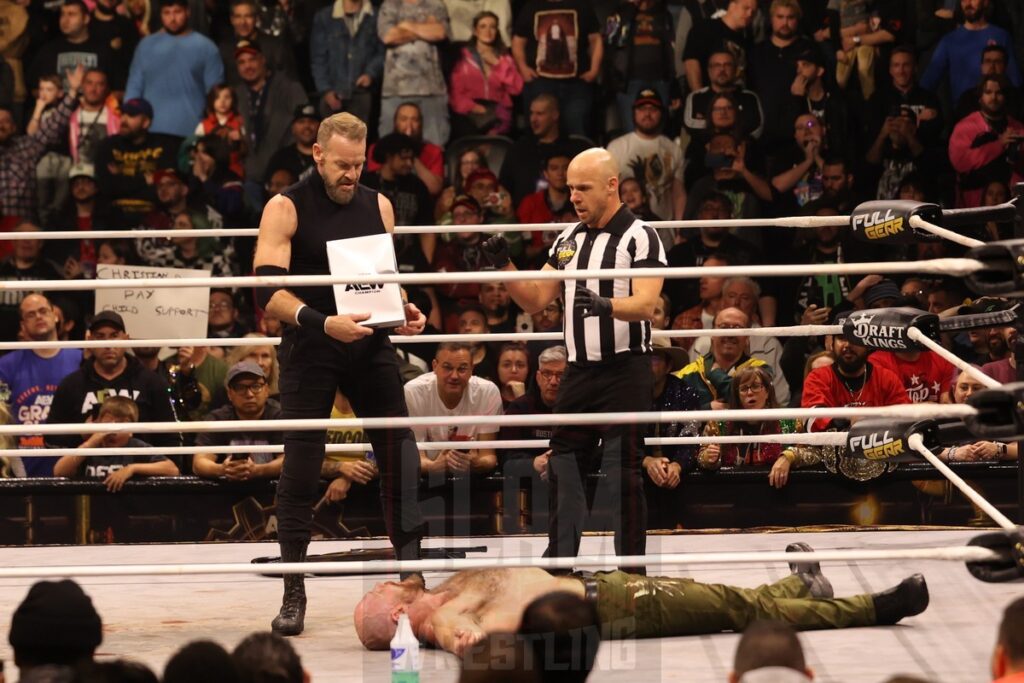 Christian Cage looks down at Jon Moxley at AEW Full Gear on Saturday, November 23, 2024, at the Prudential Center in Newark, NJ. Photo by George Tahinos, https://georgetahinos.smugmug.com