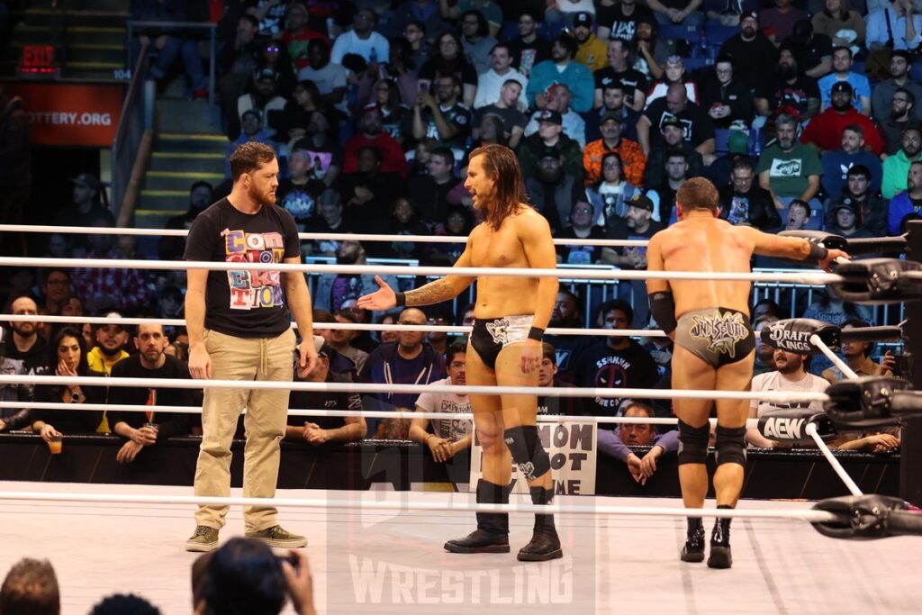 Adam Cole reaches out to Kyle O'Reilly at AEW Dynamite on Wednesday, November 13, 2024, at the Total Mortgage Arena, in Bridgeport, Connecticut. Photo by George Tahinos, georgetahinos.smugmug.com