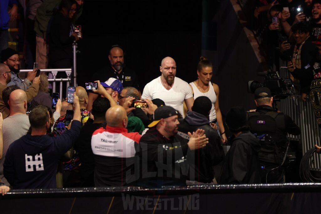 Marina Sharif and Jon Moxley arrive through the crowd at AEW Dynamite on Wednesday, November 13, 2024, at the Total Mortgage Arena, in Bridgeport, Connecticut. Photo by George Tahinos, georgetahinos.smugmug.com