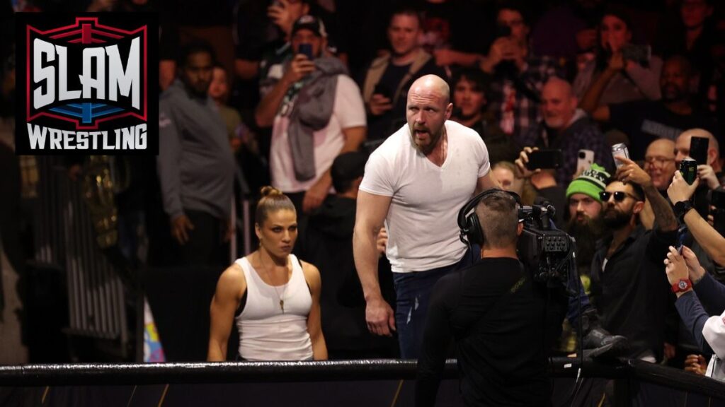 Marina Sharif and Jon Moxley arrive through the crowd at AEW Dynamite on Wednesday, November 13, 2024, at the Total Mortgage Arena, in Bridgeport, Connecticut. Photo by George Tahinos, georgetahinos.smugmug.com