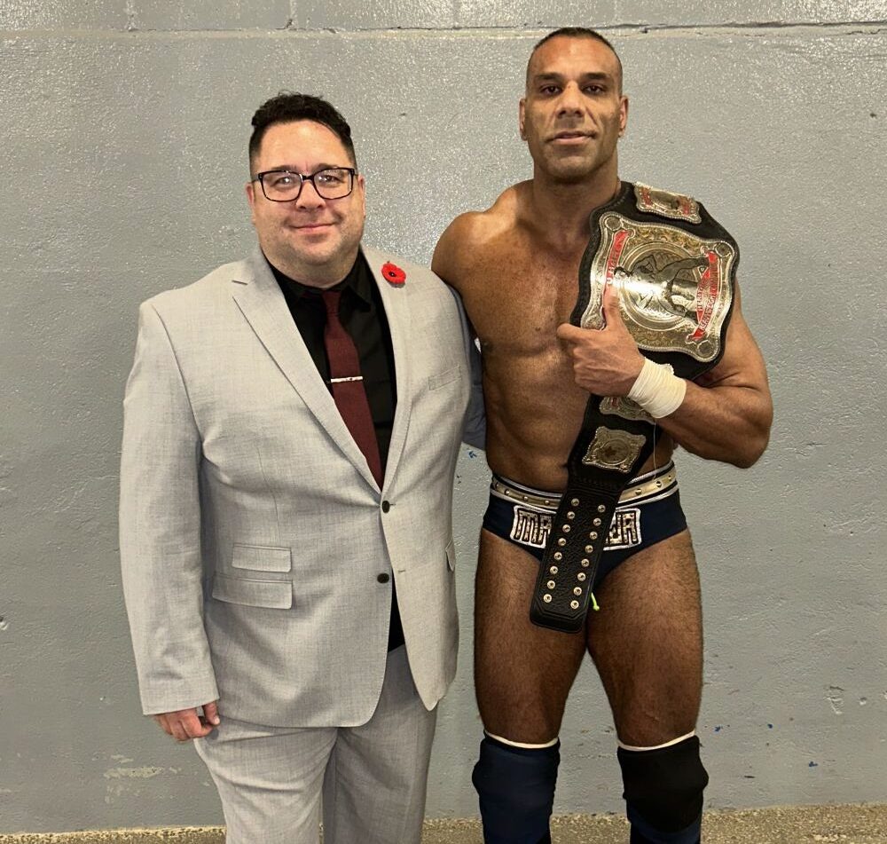 Mike McGuire with Raj Dhesi after Dhesi beat Chris Masters for the Stu Hart Heritage Championship in Calgary on November 10, 2024.