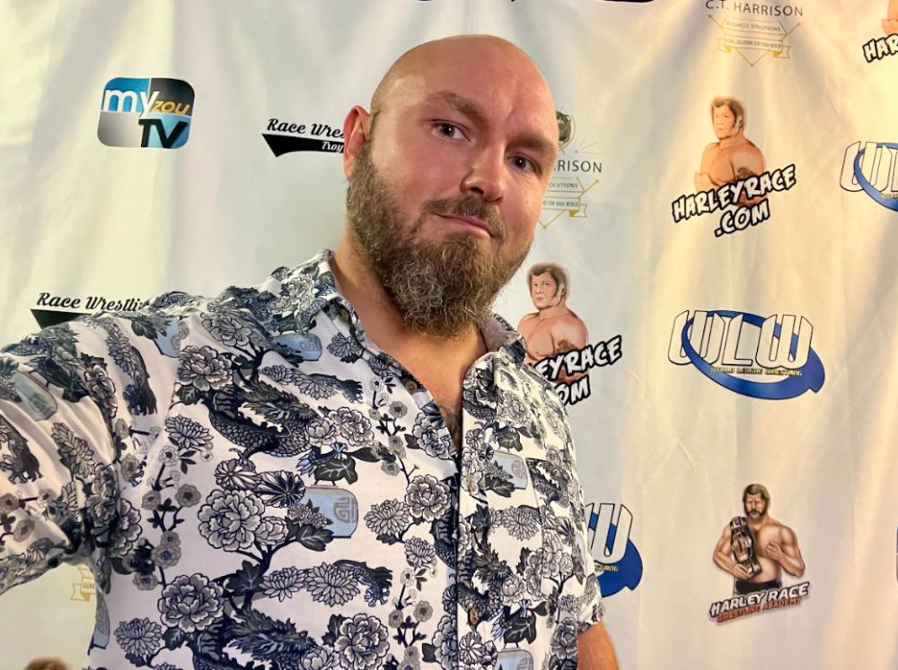 Here's a selfie of me with the WLW and Harley Race backdrop. Photo by Jeremiah Plunkett