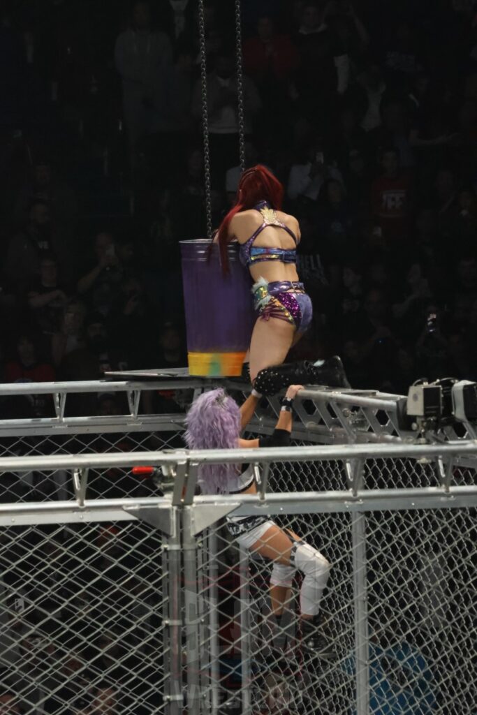 WarGames match: Rhea Ripley, Bayley, Bianca Belair, Iyo Sky, and Naomi vs. Liv Morgan, Racquel Rodriguez, Nia Jax, Candice LeRea, and Tiffany Stratton at WWE Survivor Series: War Games, at the Rogers Arena in Vancouver, BC, on Saturday, November 30, 2024. Photo by Mike Mastrandrea, https://www.instagram.com/mikemastrandrea_photography