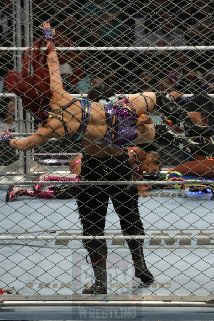 WarGames match: Rhea Ripley, Bayley, Bianca Belair, Iyo Sky, and Naomi vs. Liv Morgan, Racquel Rodriguez, Nia Jax, Candice LeRea, and Tiffany Stratton at WWE Survivor Series: War Games, at the Rogers Arena in Vancouver, BC, on Saturday, November 30, 2024. Photo by Mike Mastrandrea, https://www.instagram.com/mikemastrandrea_photography