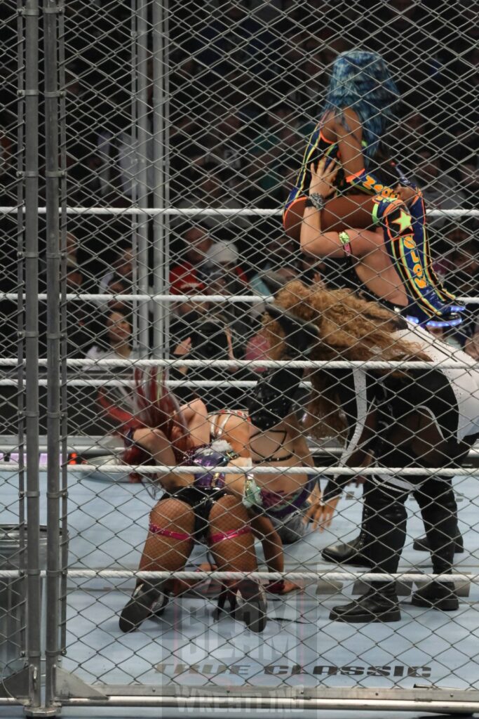 WarGames match: Rhea Ripley, Bayley, Bianca Belair, Iyo Sky, and Naomi vs. Liv Morgan, Racquel Rodriguez, Nia Jax, Candice LeRea, and Tiffany Stratton at WWE Survivor Series: War Games, at the Rogers Arena in Vancouver, BC, on Saturday, November 30, 2024. Photo by Mike Mastrandrea, https://www.instagram.com/mikemastrandrea_photography