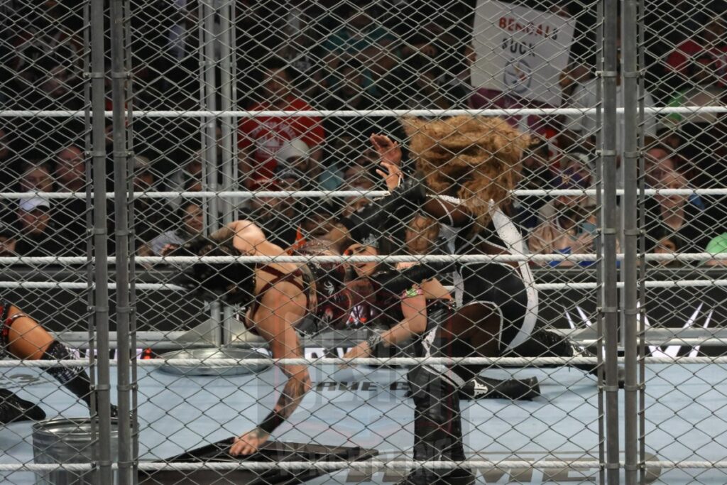 WarGames match: Rhea Ripley, Bayley, Bianca Belair, Iyo Sky, and Naomi vs. Liv Morgan, Racquel Rodriguez, Nia Jax, Candice LeRea, and Tiffany Stratton at WWE Survivor Series: War Games, at the Rogers Arena in Vancouver, BC, on Saturday, November 30, 2024. Photo by Mike Mastrandrea, https://www.instagram.com/mikemastrandrea_photography