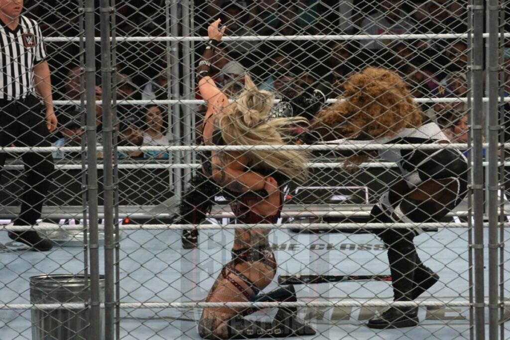 WarGames match: Rhea Ripley, Bayley, Bianca Belair, Iyo Sky, and Naomi vs. Liv Morgan, Racquel Rodriguez, Nia Jax, Candice LeRea, and Tiffany Stratton at WWE Survivor Series: War Games, at the Rogers Arena in Vancouver, BC, on Saturday, November 30, 2024. Photo by Mike Mastrandrea, https://www.instagram.com/mikemastrandrea_photography