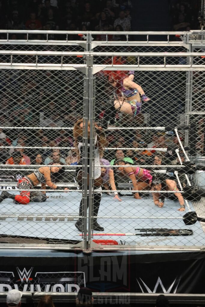 WarGames match: Rhea Ripley, Bayley, Bianca Belair, Iyo Sky, and Naomi vs. Liv Morgan, Racquel Rodriguez, Nia Jax, Candice LeRea, and Tiffany Stratton at WWE Survivor Series: War Games, at the Rogers Arena in Vancouver, BC, on Saturday, November 30, 2024. Photo by Mike Mastrandrea, https://www.instagram.com/mikemastrandrea_photography