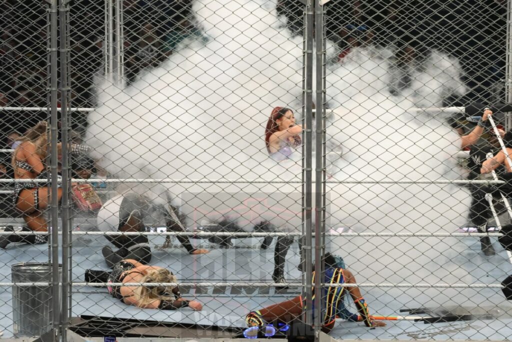 WarGames match: Rhea Ripley, Bayley, Bianca Belair, Iyo Sky, and Naomi vs. Liv Morgan, Racquel Rodriguez, Nia Jax, Candice LeRea, and Tiffany Stratton at WWE Survivor Series: War Games, at the Rogers Arena in Vancouver, BC, on Saturday, November 30, 2024. Photo by Mike Mastrandrea, https://www.instagram.com/mikemastrandrea_photography