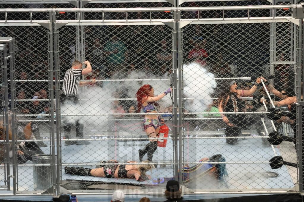 WarGames match: Rhea Ripley, Bayley, Bianca Belair, Iyo Sky, and Naomi vs. Liv Morgan, Racquel Rodriguez, Nia Jax, Candice LeRea, and Tiffany Stratton at WWE Survivor Series: War Games, at the Rogers Arena in Vancouver, BC, on Saturday, November 30, 2024. Photo by Mike Mastrandrea, https://www.instagram.com/mikemastrandrea_photography