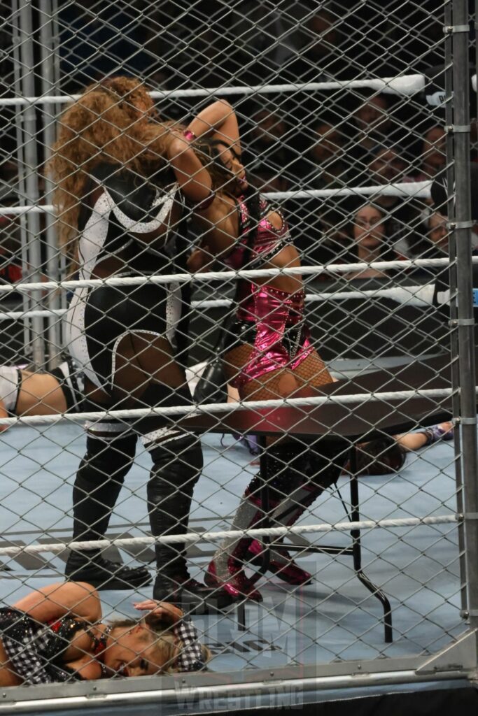 WarGames match: Rhea Ripley, Bayley, Bianca Belair, Iyo Sky, and Naomi vs. Liv Morgan, Racquel Rodriguez, Nia Jax, Candice LeRea, and Tiffany Stratton at WWE Survivor Series: War Games, at the Rogers Arena in Vancouver, BC, on Saturday, November 30, 2024. Photo by Mike Mastrandrea, https://www.instagram.com/mikemastrandrea_photography