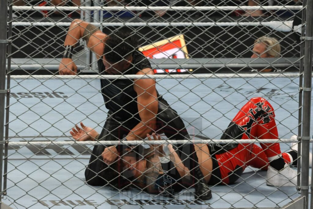 WarGames match: Roman Reigns, Sami Zayn, Jimmy Uso, Jey Uso, and CM Punk vs. Solo Sikoa, Tonga Loa, Tama Tonga, Jacob Fatu, and Bronson Reed at WWE Survivor Series: War Games, at the Rogers Arena in Vancouver, BC, on Saturday, November 30, 2024. Photo by Mike Mastrandrea, https://www.instagram.com/mikemastrandrea_photography