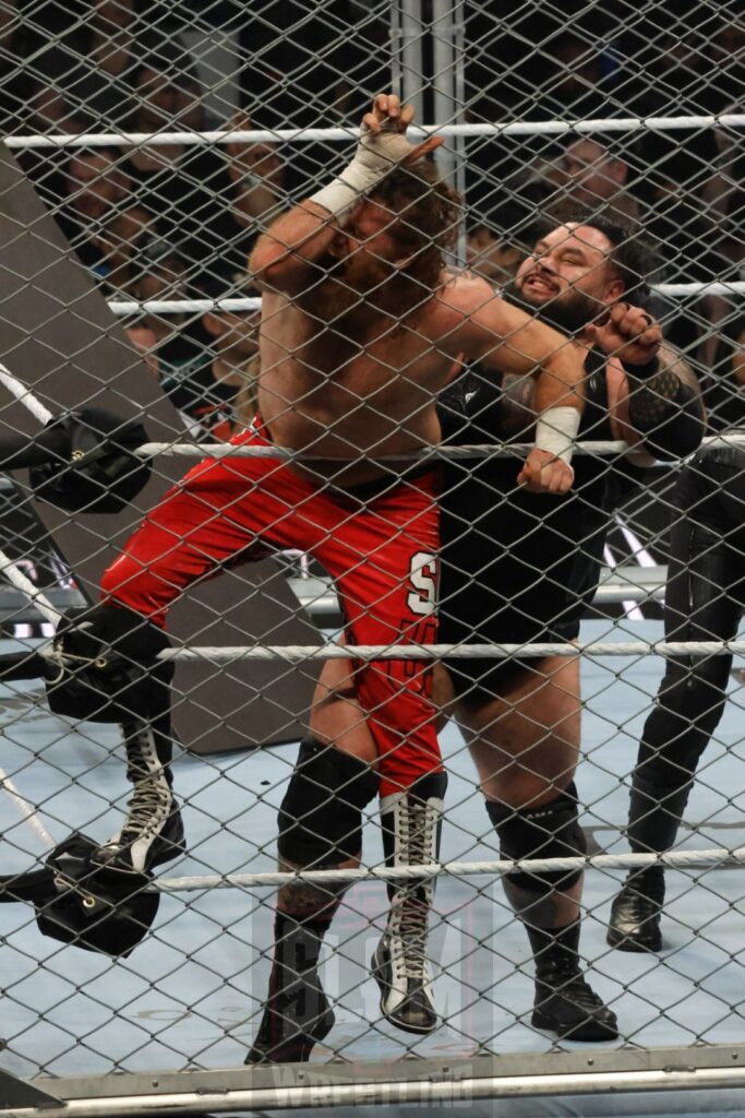 WarGames match: Roman Reigns, Sami Zayn, Jimmy Uso, Jey Uso, and CM Punk vs. Solo Sikoa, Tonga Loa, Tama Tonga, Jacob Fatu, and Bronson Reed at WWE Survivor Series: War Games, at the Rogers Arena in Vancouver, BC, on Saturday, November 30, 2024. Photo by Mike Mastrandrea, https://www.instagram.com/mikemastrandrea_photography