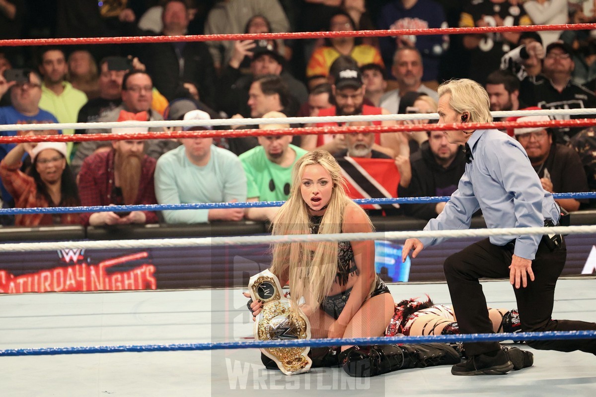 Women's World Champion Liv Morgan and referee Charles Robinson at WWE Saturday Night's Main Event on Saturday, December 14, 2024, at the Nassau Veterans Memorial Coliseum in Uniondale, New York. Photo by George Tahinos, georgetahinos.smugmug.com