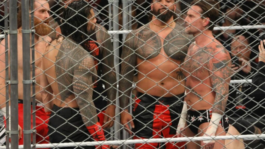 Roman Reigns and CM Punk consider their options during the men's WarGames match at WWE Survivor Series: War Games, at the Rogers Arena in Vancouver, BC, on Saturday, November 30, 2024. Photo by Mike Mastrandrea, https://www.instagram.com/mikemastrandrea_photography