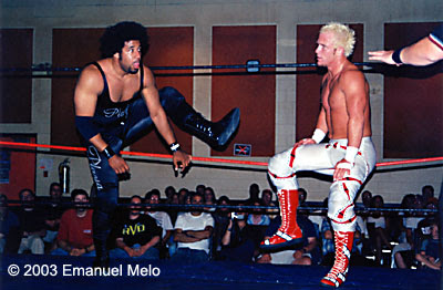JT Playa and Eric Young in NEO Spirit Pro Wrestling on July 19, 2003. Photo by Emanuel Melo