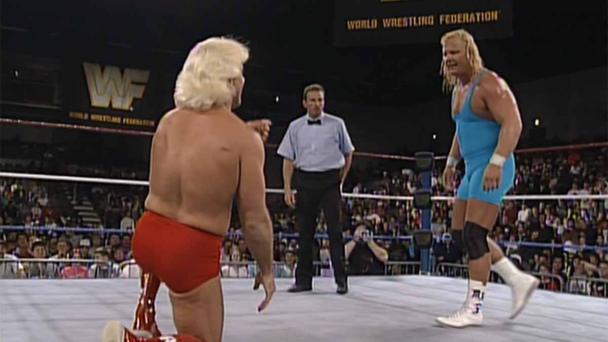Mr. Perfect Curt Hennig is having a great time at Ric Flair's expense. Courtesy: WWE Network.