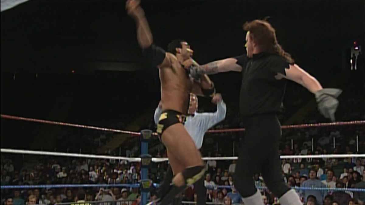 Undertaker gets his hands on Razor Ramon. Courtesy: WWE Network.