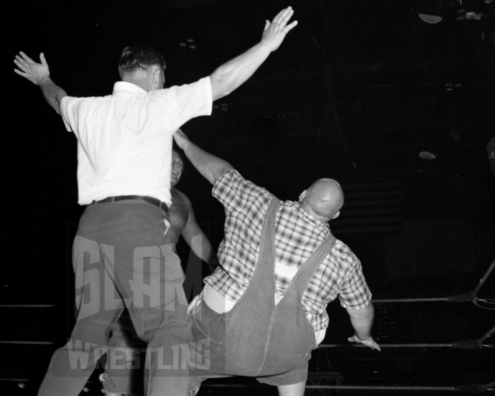 Yukon Eric knocks Haystacks Muldoon to the ground. Photo by Earle Yetter, courtesy Chris Swisher